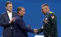 Брянский Герой России получил партбилет из рук Дмитрия Медведева