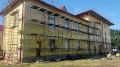 В Володарском районе начали утеплять фасад городского дворца культуры