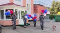 В Брянске росгвардейцы провели патриотическую акцию, посвященную Дню Государственного флага